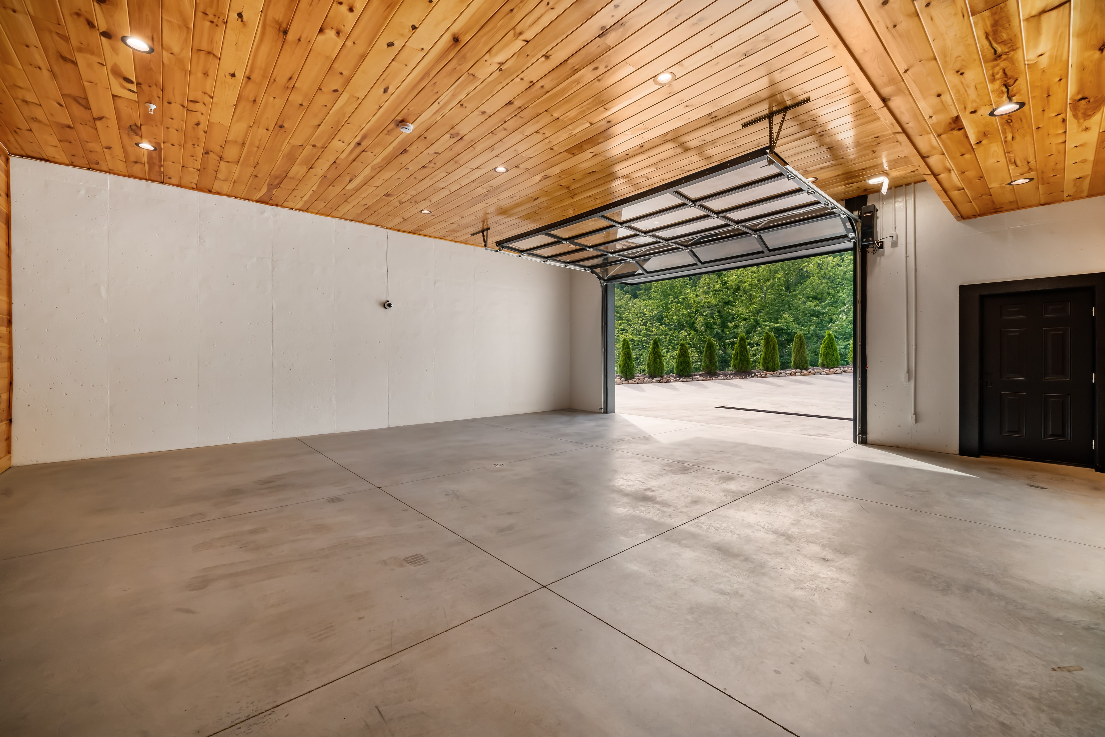 Excalibur 2-car garage level with elevator access and complimentary bellman cart luxury lodge